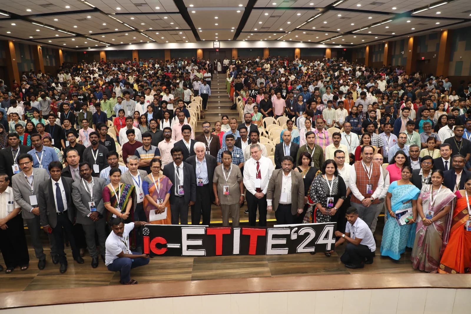 Auditorium Gathering with ic-ETITE Conference Banner at VIT Vellore